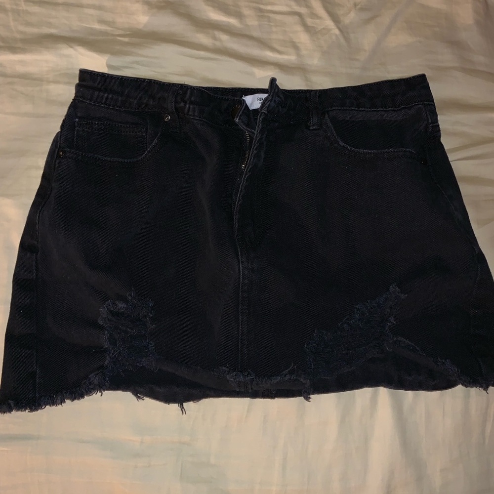 Distressed denim mini skirt
